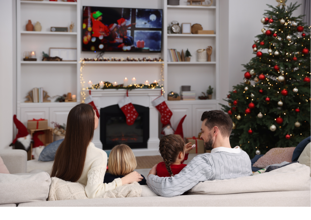 Family in clean and tidy home enjoying a christmas movie