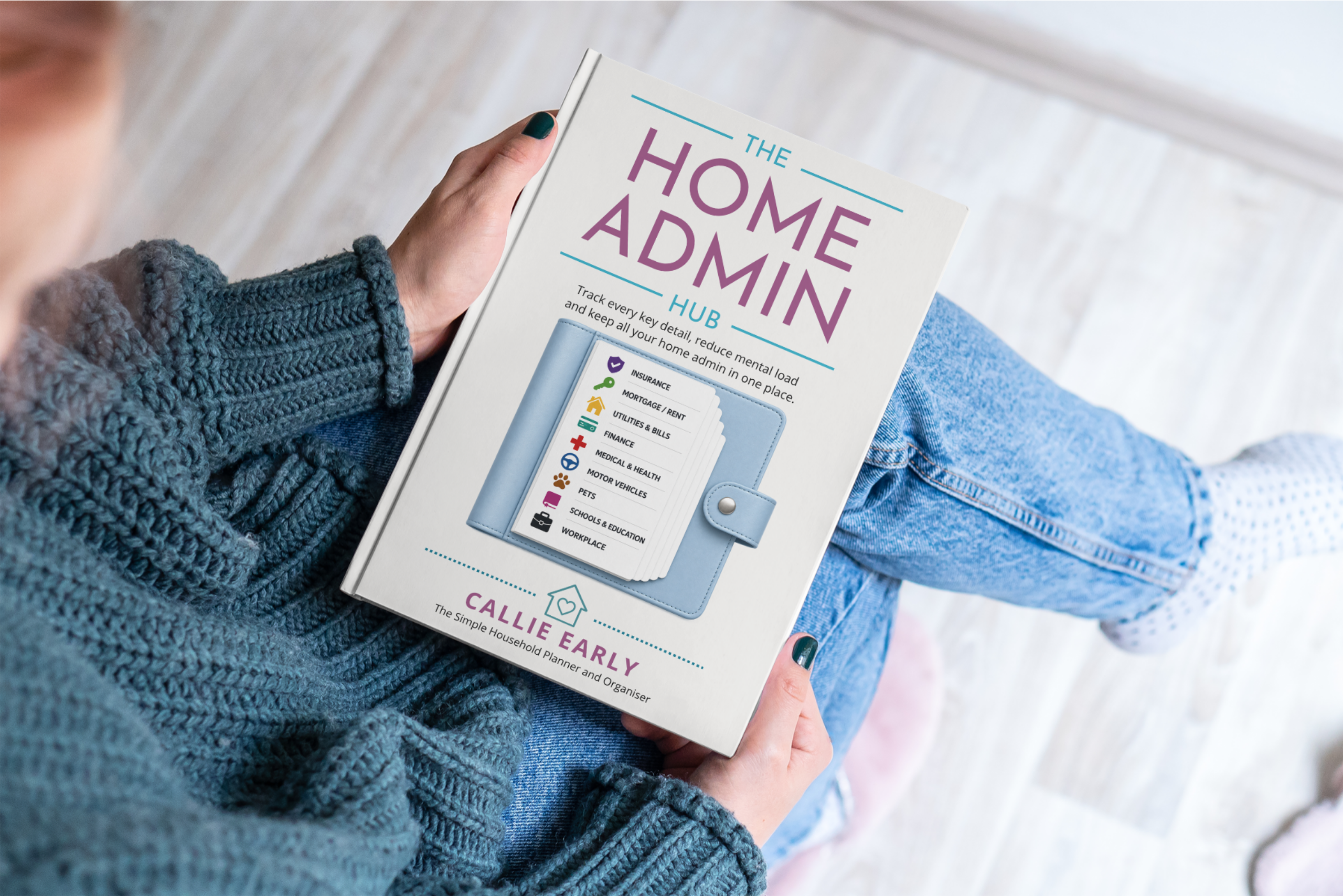 woman with a copy of The Home Admin Hub book on her lap