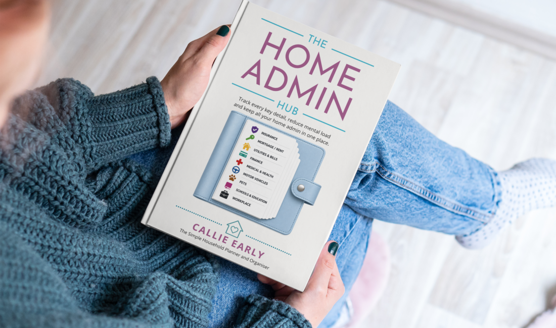 woman with a copy of The Home Admin Hub book on her lap